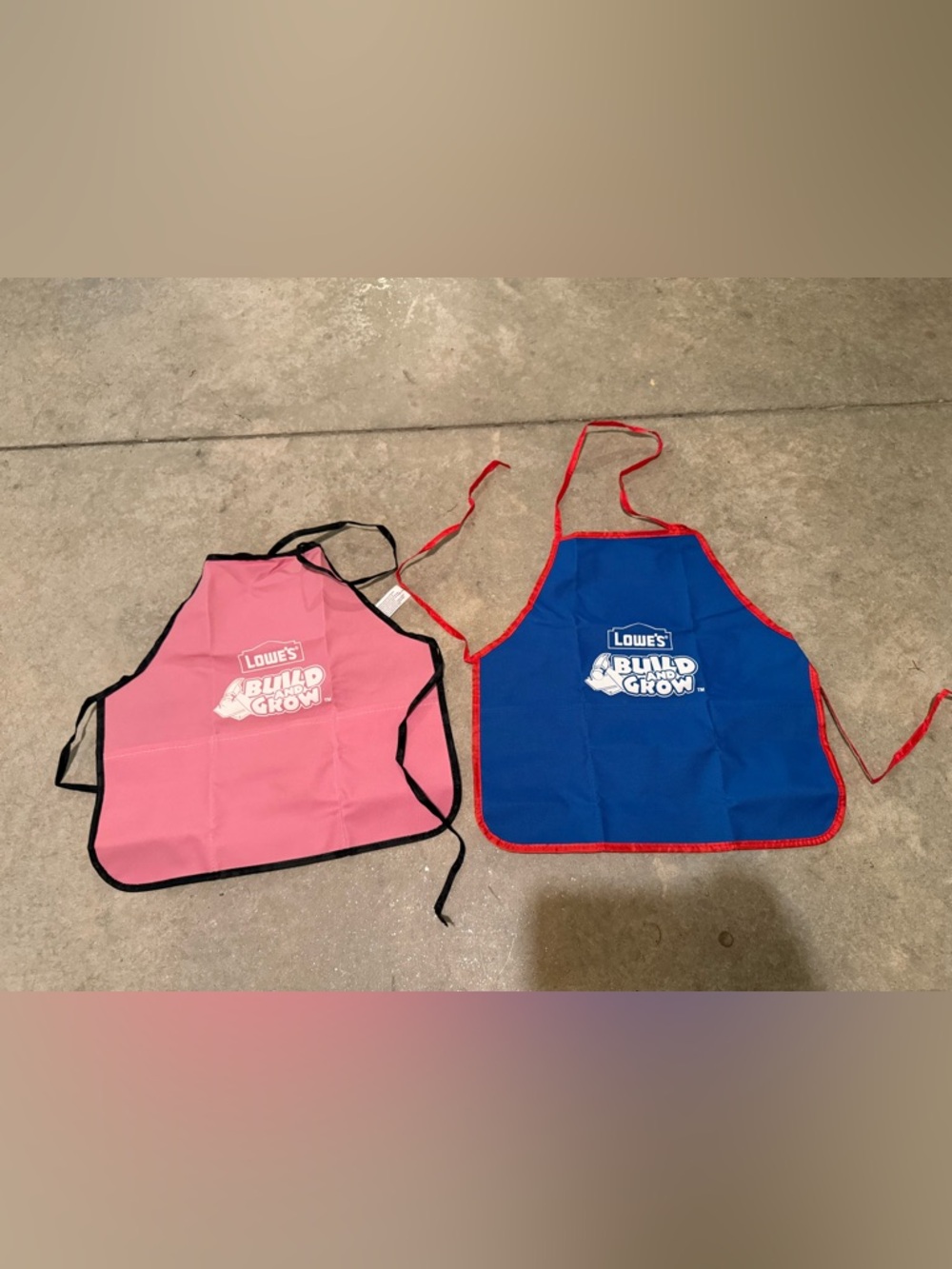 Lowe's Build and Grow Toddler Aprons - Blue & Pink
